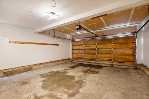 131 Stratton Crescent Sw, Calgary, AB - Indoor Photo Showing Garage
