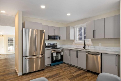 131 Stratton Crescent Sw, Calgary, AB - Indoor Photo Showing Kitchen With Stainless Steel Kitchen