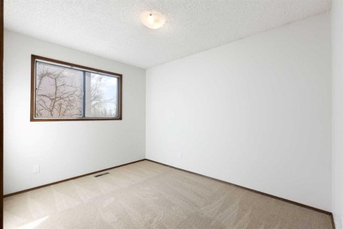 12 Castlefall Road Ne, Calgary, AB - Indoor Photo Showing Other Room