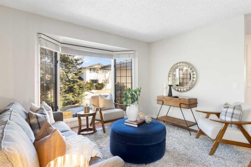 12 Castlefall Road Ne, Calgary, AB - Indoor Photo Showing Living Room