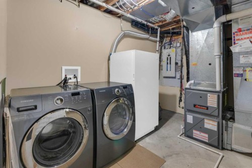 24 Evansbrooke Point Nw, Calgary, AB - Indoor Photo Showing Laundry Room