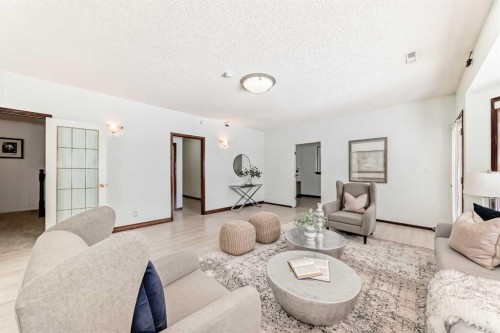 218 Schiller Place Nw, Calgary, AB - Indoor Photo Showing Living Room