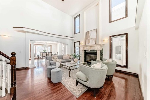 218 Schiller Place Nw, Calgary, AB - Indoor Photo Showing Living Room With Fireplace