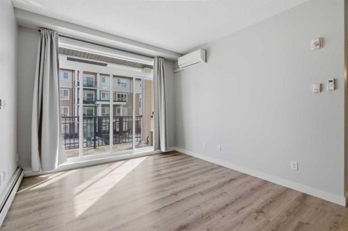 213-20 Walgrove Walk Se, Calgary, AB - Indoor Photo Showing Other Room