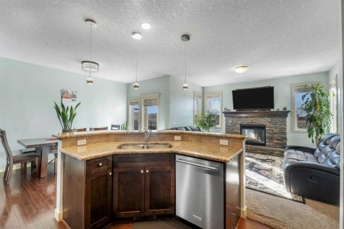 156 Bishop Crescent Nw, Langdon, AB - Indoor With Fireplace