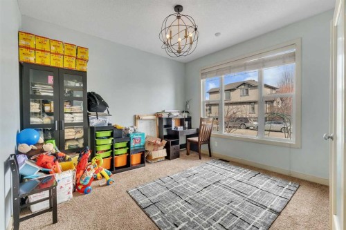 156 Bishop Crescent Nw, Langdon, AB - Indoor Photo Showing Other Room