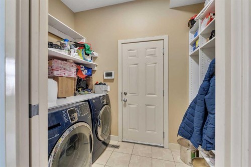 156 Bishop Crescent Nw, Langdon, AB - Indoor Photo Showing Laundry Room