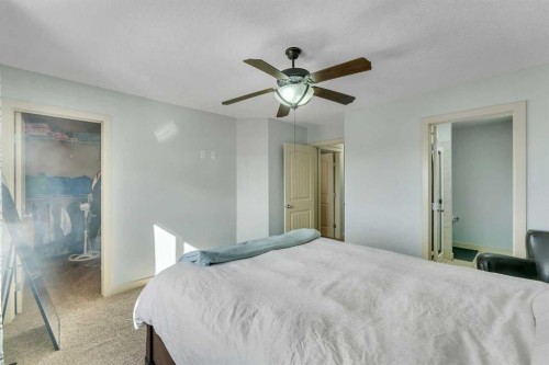 156 Bishop Crescent Nw, Langdon, AB - Indoor Photo Showing Bedroom