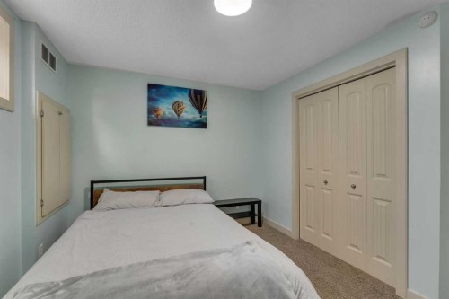 156 Bishop Crescent Nw, Langdon, AB - Indoor Photo Showing Bedroom
