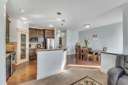 156 Bishop Crescent Nw, Langdon, AB - Indoor Photo Showing Kitchen With Stainless Steel Kitchen With Upgraded Kitchen