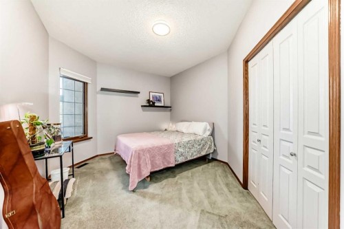 60 Hamptons Terrace Nw, Calgary, AB - Indoor Photo Showing Bedroom