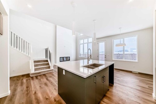 23 Bartlett Crescent Se, Calgary, AB - Indoor Photo Showing Kitchen With Double Sink