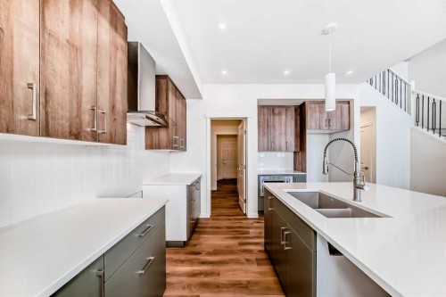 23 Bartlett Crescent Se, Calgary, AB - Indoor Photo Showing Kitchen With Double Sink With Upgraded Kitchen