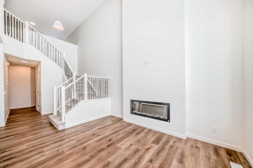 23 Bartlett Crescent Se, Calgary, AB - Indoor With Fireplace