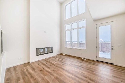 23 Bartlett Crescent Se, Calgary, AB - Indoor With Fireplace