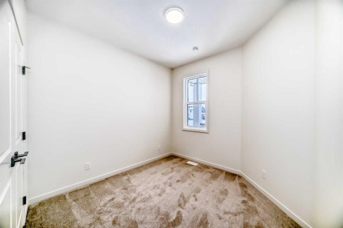 23 Bartlett Crescent Se, Calgary, AB - Indoor Photo Showing Other Room