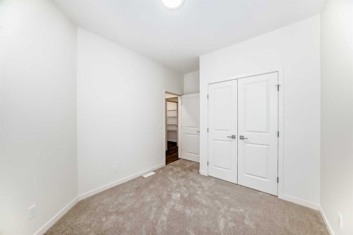 23 Bartlett Crescent Se, Calgary, AB - Indoor Photo Showing Other Room