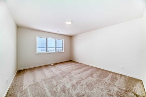 23 Bartlett Crescent Se, Calgary, AB - Indoor Photo Showing Other Room