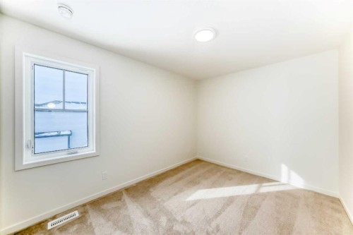 23 Bartlett Crescent Se, Calgary, AB - Indoor Photo Showing Other Room