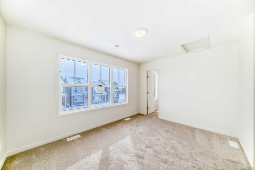 23 Bartlett Crescent Se, Calgary, AB - Indoor Photo Showing Other Room