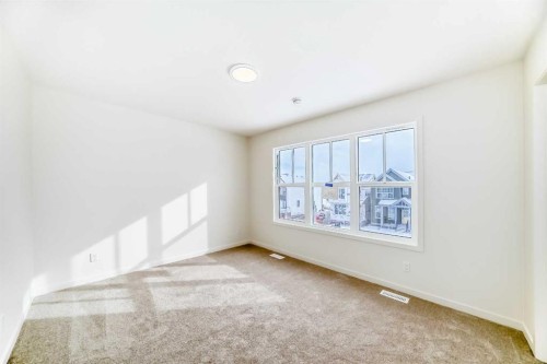 23 Bartlett Crescent Se, Calgary, AB - Indoor Photo Showing Other Room