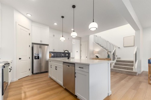 80 Creekside Path Sw, Calgary, AB - Indoor Photo Showing Kitchen With Stainless Steel Kitchen With Upgraded Kitchen