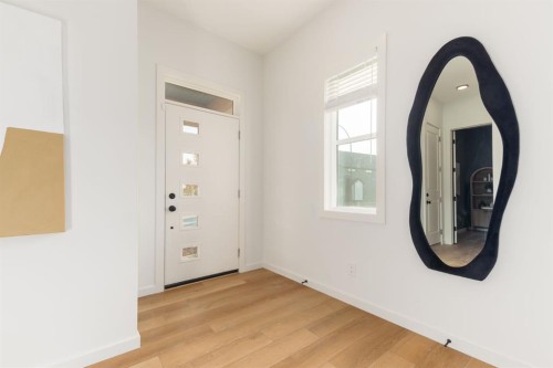 80 Creekside Path Sw, Calgary, AB - Indoor Photo Showing Other Room