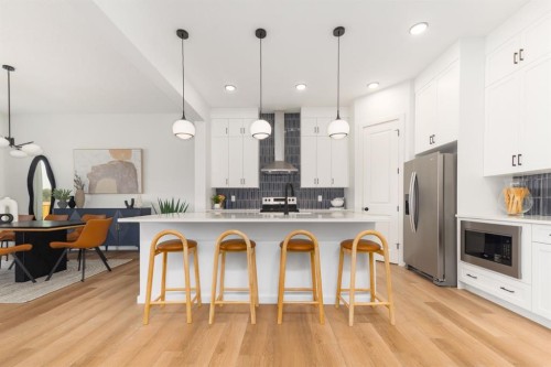 80 Creekside Path Sw, Calgary, AB - Indoor Photo Showing Kitchen With Stainless Steel Kitchen With Upgraded Kitchen