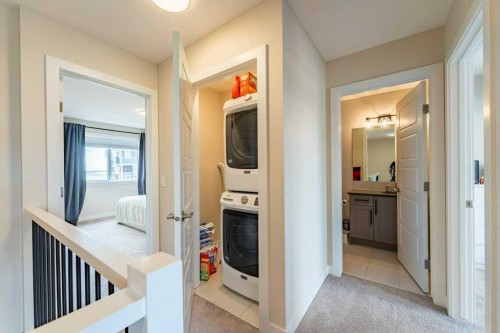 153 Waterford Boulevard, Chestermere, AB - Indoor Photo Showing Other Room