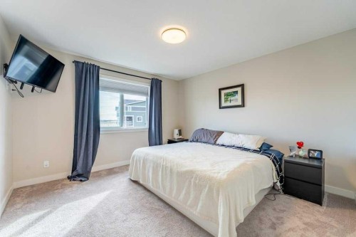 153 Waterford Boulevard, Chestermere, AB - Indoor Photo Showing Bedroom