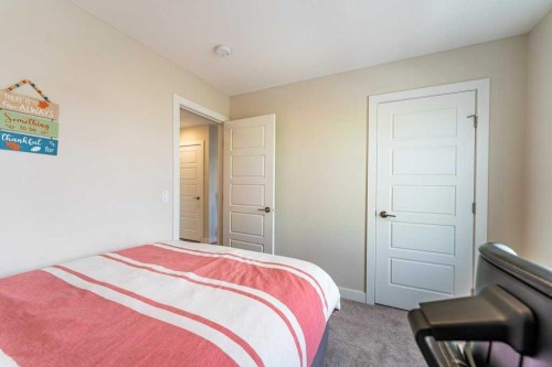 153 Waterford Boulevard, Chestermere, AB - Indoor Photo Showing Bedroom