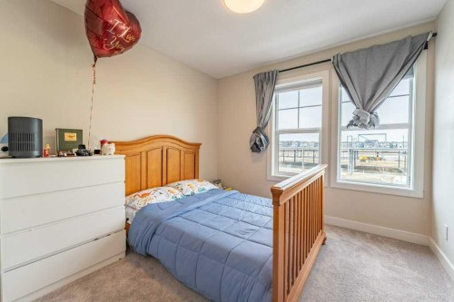 153 Waterford Boulevard, Chestermere, AB - Indoor Photo Showing Bedroom