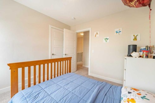 153 Waterford Boulevard, Chestermere, AB - Indoor Photo Showing Bedroom