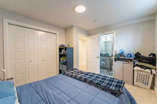 153 Waterford Boulevard, Chestermere, AB - Indoor Photo Showing Bedroom