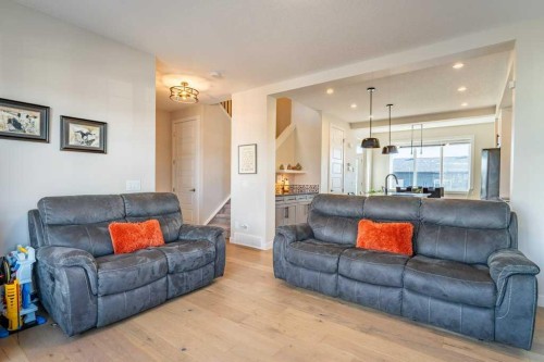 153 Waterford Boulevard, Chestermere, AB - Indoor Photo Showing Living Room