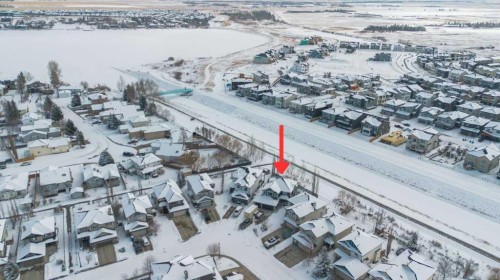 392 Rainbow Falls Way, Chestermere, AB - Outdoor With Body Of Water With View