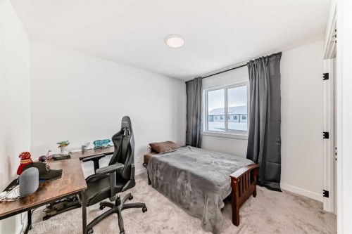 123 Harmony Circle, Rural Rocky View County, AB - Indoor Photo Showing Bedroom