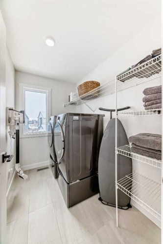 123 Harmony Circle, Rural Rocky View County, AB - Indoor Photo Showing Laundry Room