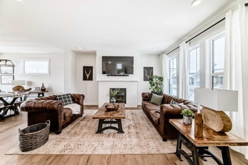 123 Harmony Circle, Rural Rocky View County, AB - Indoor Photo Showing Living Room With Fireplace