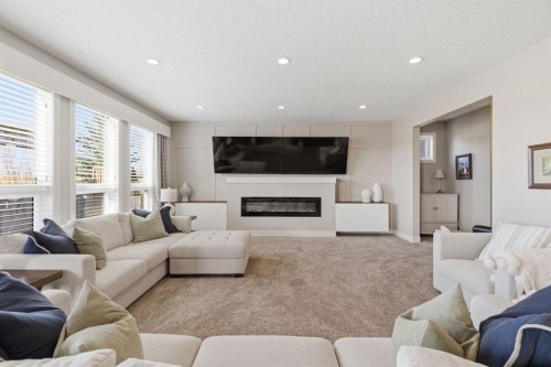 124 Ranch Road, Okotoks, AB - Indoor Photo Showing Living Room With Fireplace