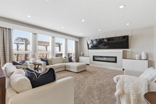124 Ranch Road, Okotoks, AB - Indoor Photo Showing Living Room With Fireplace