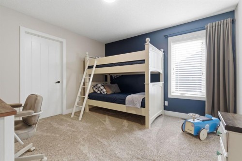 124 Ranch Road, Okotoks, AB - Indoor Photo Showing Bedroom