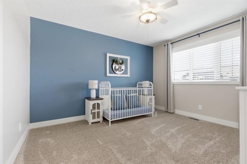124 Ranch Road, Okotoks, AB - Indoor Photo Showing Bedroom