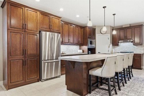 124 Ranch Road, Okotoks, AB - Indoor Photo Showing Kitchen With Upgraded Kitchen