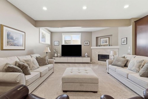 124 Ranch Road, Okotoks, AB - Indoor Photo Showing Living Room With Fireplace
