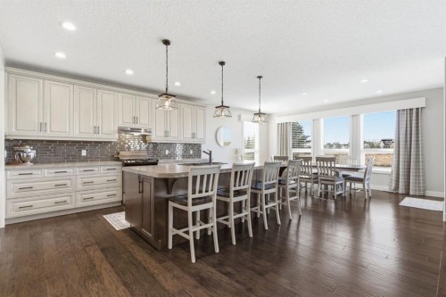 124 Ranch Road, Okotoks, AB - Indoor Photo Showing Kitchen With Upgraded Kitchen