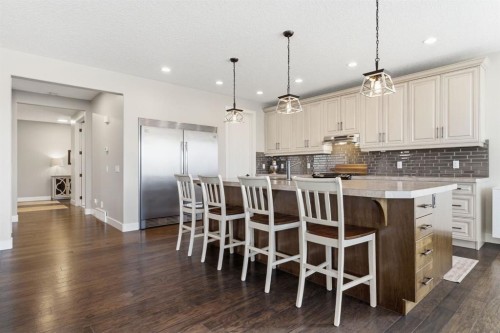 124 Ranch Road, Okotoks, AB - Indoor Photo Showing Kitchen With Upgraded Kitchen