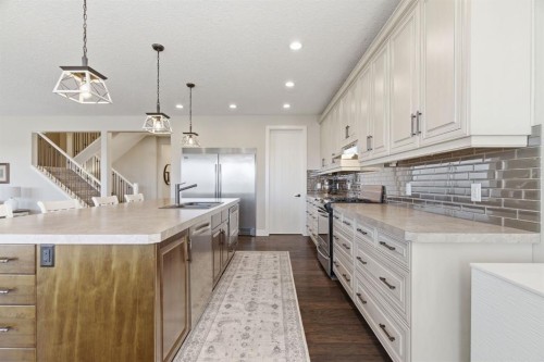 124 Ranch Road, Okotoks, AB - Indoor Photo Showing Kitchen With Upgraded Kitchen
