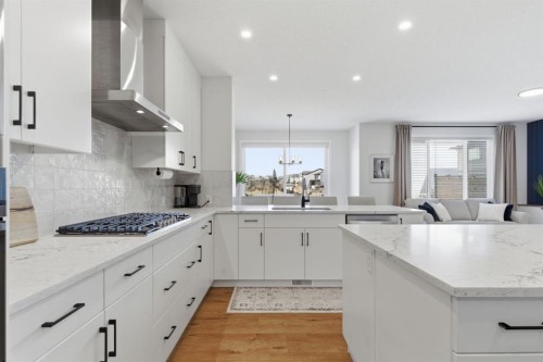 117 Ranchers View, Okotoks, AB - Indoor Photo Showing Kitchen With Upgraded Kitchen