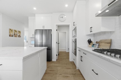 117 Ranchers View, Okotoks, AB - Indoor Photo Showing Kitchen With Upgraded Kitchen